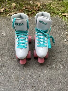Impala White Roller Skates with Pink Wheels and Teal Laces